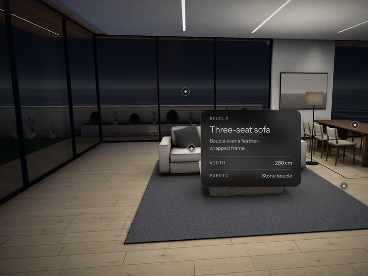 A walkthrough: the living room at dusk, with the sofa's detail card open.